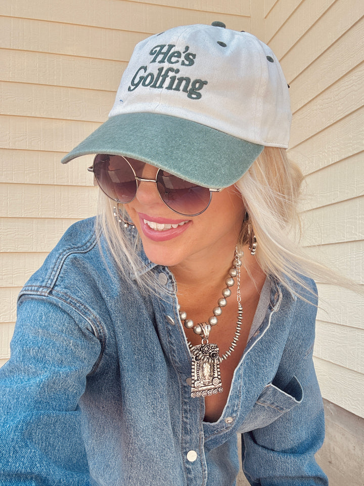 He's Golfing Dad Cap Hat