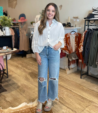 The Laya Distressed Flare Jean